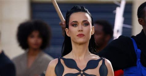 Katy Perry goes topless in black fur coat at Paris Fashion Week